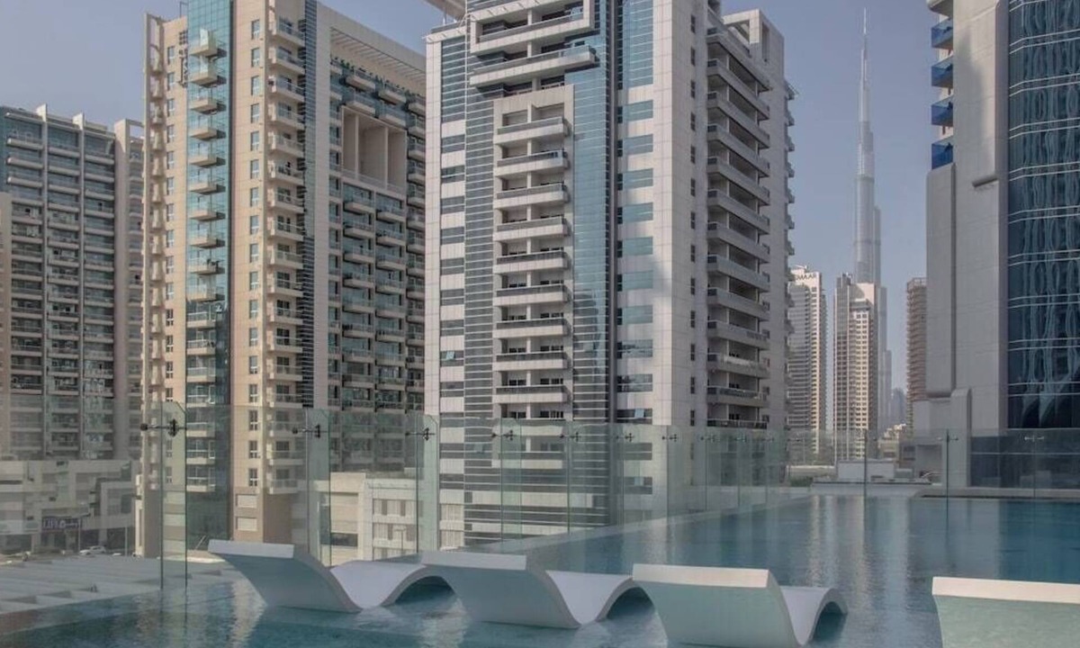 Business Bay Apartment | AWS Holiday Homes - Luxury Living besides Canal
