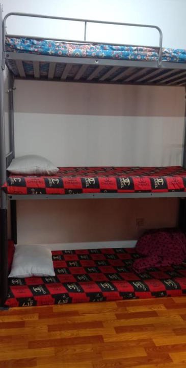 Sharjah House | Dormitory bed space in a shared room