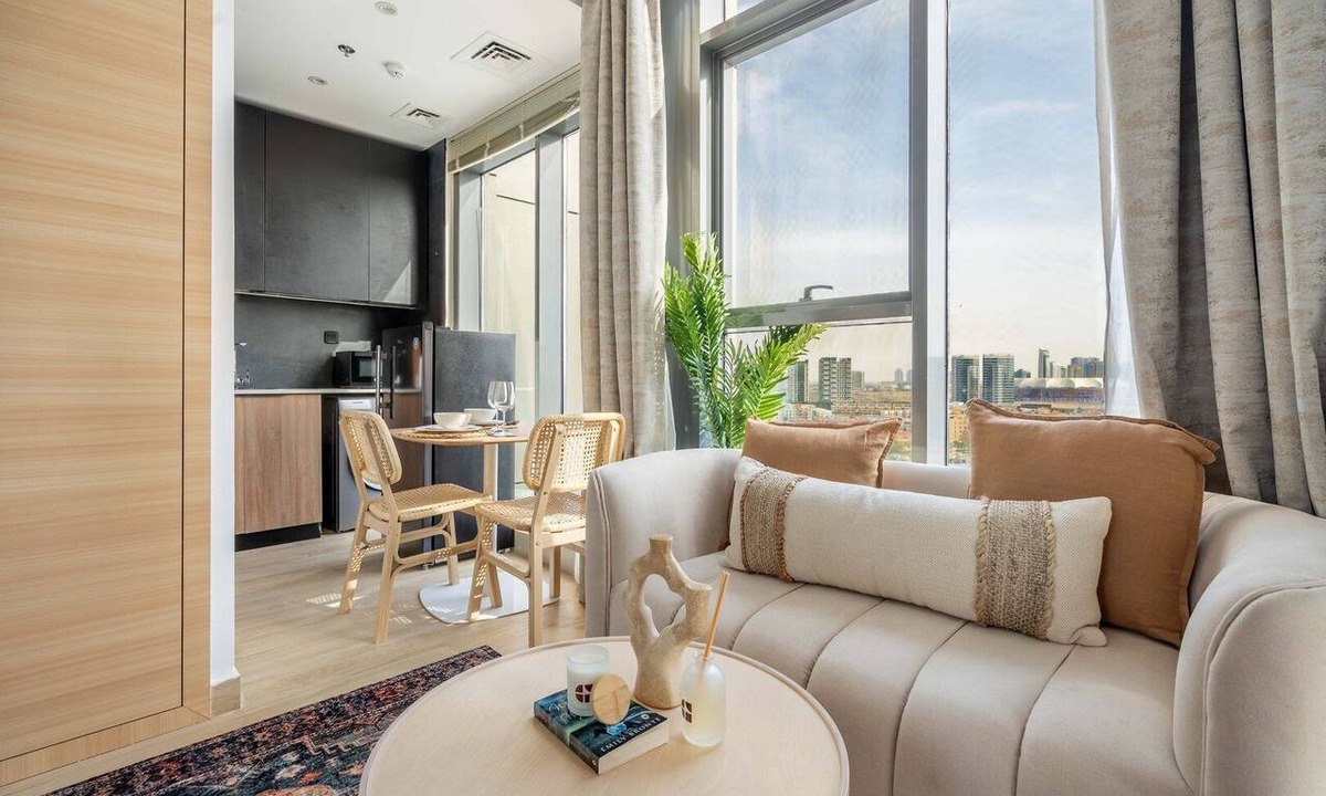 Jumeirah Village Circle Apartment | GuestReady - Arabic Charm | Balcony | Regina Tower