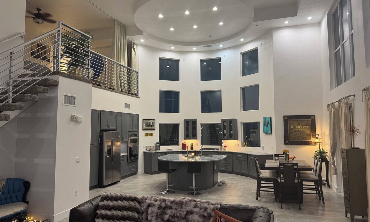 Rancho Oakey Condo | Incredible 2 level loft with 30ft ceilings -expansive balcony with STRIP VIEWS!