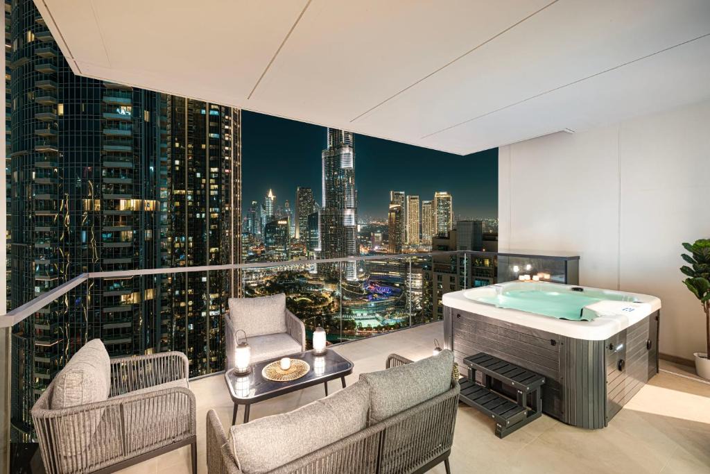 Downtown Dubai Apartment | Luxury Downtown 3 Bedroom and Maid Room Apartment with amazing Burj View and Private Jacuzzi on a large Balcony