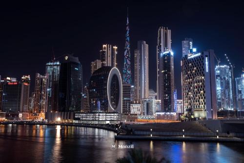 Business Bay Apartment | Manzil - 1BR Apartment in The Bay with Canal View
