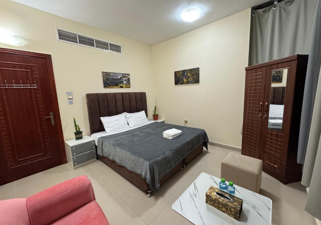Al Ain House | Shared bath rooms only