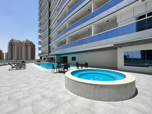 Dubai Sports City Apartment | Stylish Studio Urban Retreat