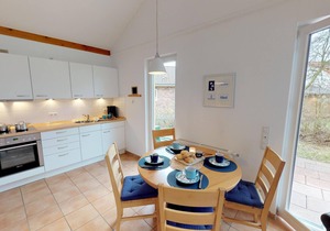 Beautiful vacation home for 2 adults and 4 children with fireplace & garden near the beach in Pelzerhaken
