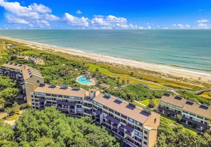Elegant ocean-view townhome with beach access & pool - perfect location