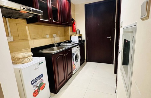 Al Hamra Village Apartment | Cozy studio with WiFi and fitness room with stunning lagoon view