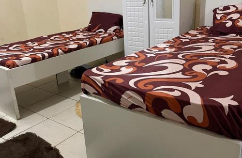 Al Qasimia Hostel | برج المحطة
