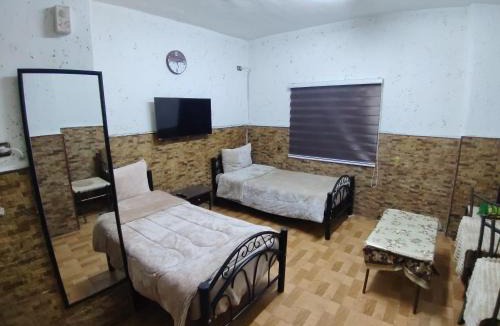 Jabal Al-Hussein Apartment | بيننا الصغير