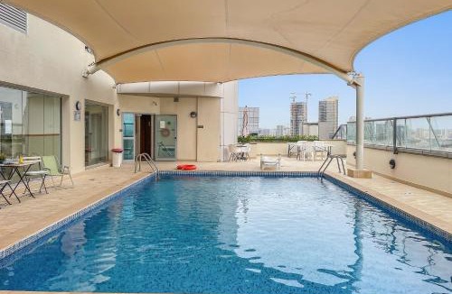 Dubai Sports City Apartment | 1BR flat close to famous The Els Club golf course
