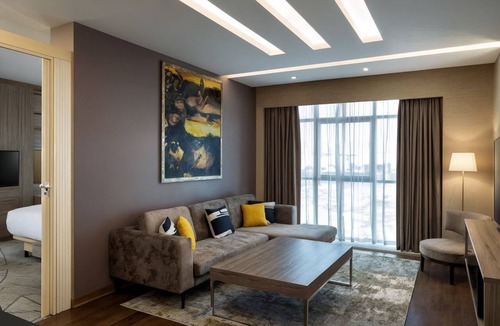 Dubai Production City Hotel | 1BR Suite | FourPoints Dubai | Extra Space, Pool + Spa, Dubai Base