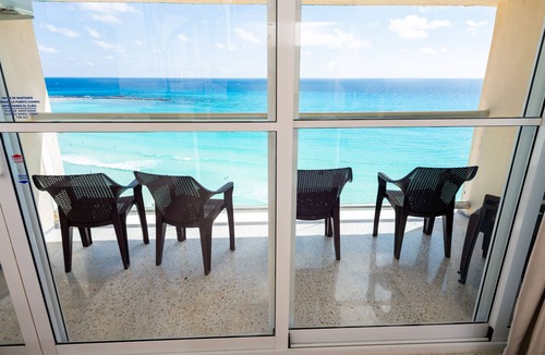 Punta Cancun Condo | 2 Story Penthouse, Beachfront, 1 Min Walk to Nightlife, Beach Access from Lobby!