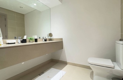 Abu Dhabi Apartment | 4BR Apt Water's Edge: Cozy Comfort & Modern Design