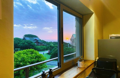 Brenton-on-Sea Apartment | A private, sunny self-catering studio 900m from a blue flag beach.