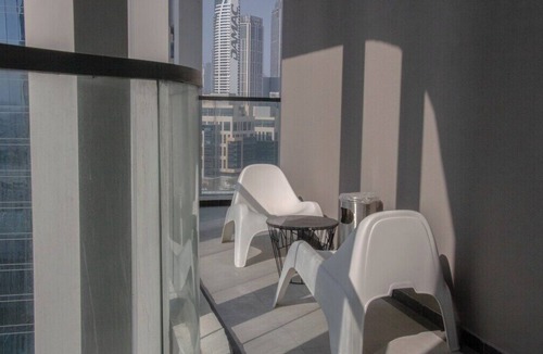 Business Bay Apartment | AWS Holiday Homes - Luxury Living besides Canal