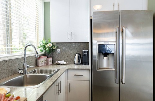 North Oyster Condo | Beach Bliss oceanfront king suite! Stunning view, patio, dock, pool & hot tub!