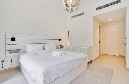 Dubai Villa | Bright and Airy 2BR, Family-Friendly with Pool and Gym