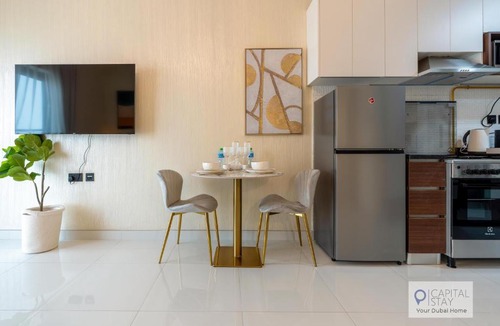 Dubai Apartment | Capital Stay - Cozy Studio in Liwan Dubai