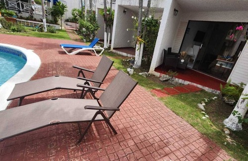 Tower Isle Apartment | Charming 1-bedroom in Tower Isle St Mary: AC, WiFi, pool, and a serene retreat.