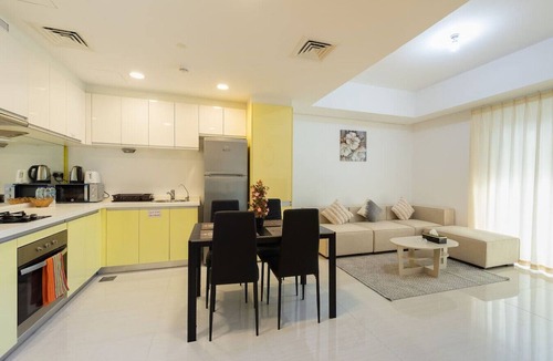 Abu Dhabi Apartment | Chic City Escape with Balcony & Pool Access