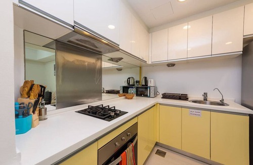 Abu Dhabi Apartment | Chic City Escape with Balcony & Pool Access
