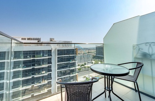 Nad Al Sheba Apartment | Chic Studio with a Community-Facing Balcony,Just Minutes by Car from Sobha Mall