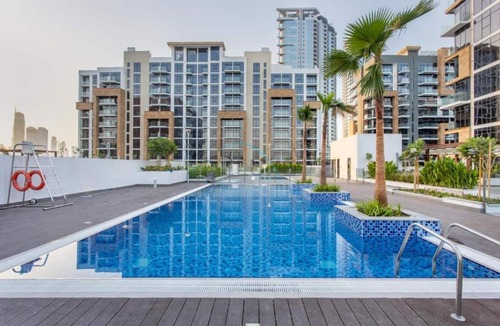 Nad Al Sheba Apartment | Chic Studio with a Community-Facing Balcony,Just Minutes by Car from Sobha Mall