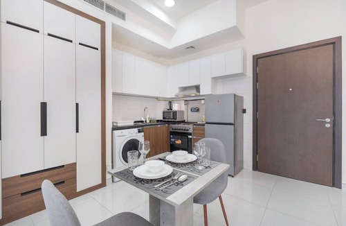 International City Apartment | Cozy Studio Apartment with Pool View in International City