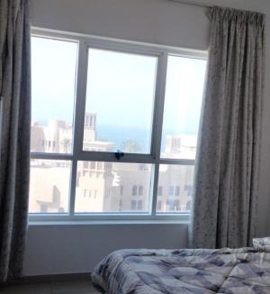 Ajman House | Elegant Sea View Bedroom with Shared Balcony and WC, Spacious and Serene Retreat - ROOM INSIDE APARTMENT