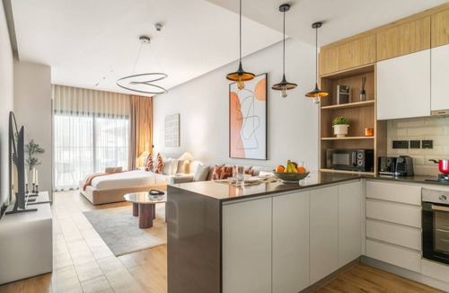 Jumeirah Village Circle Apartment | FIRST CLASS | Studio | Minimalist Chic Retreat