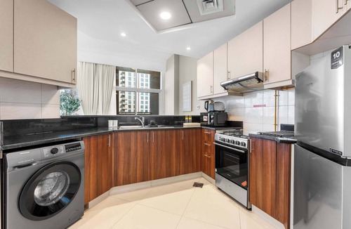 Jumeirah Village Circle Apartment | Free housekeeping visits during your stay - StayShort - Stylish 1-Bedroom Home Sleeps 4 in JVC