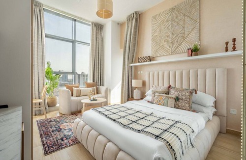Jumeirah Village Circle Apartment | GuestReady - Arabic Charm | Balcony | Regina Tower