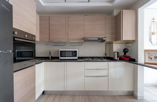 Jumeirah Village Circle Apartment | GuestReady – Bright home large balcony & pool view
