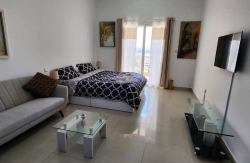 Al Hamra Village Apartment | Home away from Home