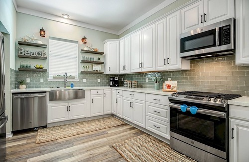 Sugarwood Beach House | Huge heated pool Close to beach and Seaside, 6 seat Gem car, pet friendly