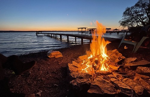 Town of Varick House | Lakefront living at its finest—private beach mornings and unforgettable Seneca Lake sunsets.