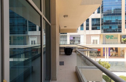 Madinat Zayed Apartment | Large Modern 1-Bedroom in Bay Square 9