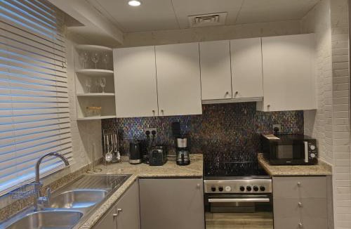 Madinat Zayed Apartment | Luxury 2 BD, A Midtown Quintessential Community