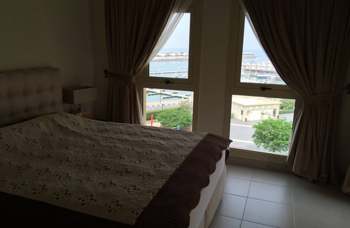 Al Hamra Village Apartment | Luxury seaside apartment