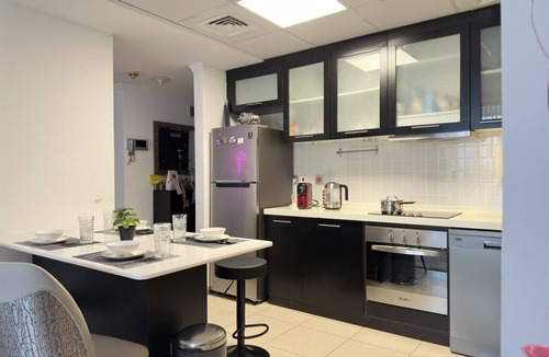 Madinat Zayed Apartment | Modern 2BR | Balcony & Sea View | Near Marina Walk