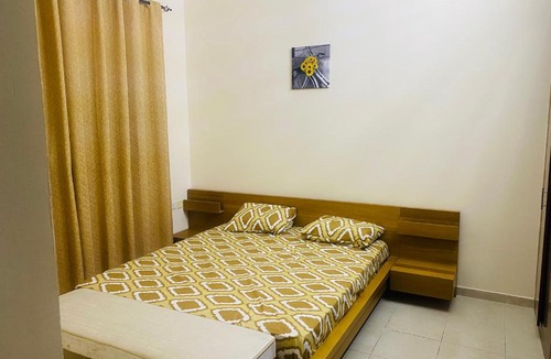 Emirates City Apartment | Modern comforts of 311 to Dubai