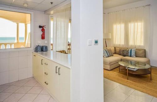 Al Hamra Village Apartment | Ocean Breeze Retreat