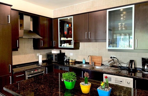Amman Apartment | Sleek & Cozy Apartment with Pool & Patio In Abdoun
