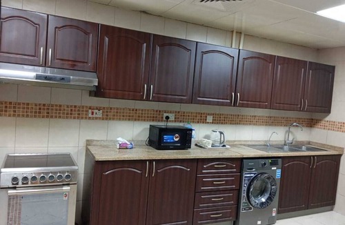 Abu Dhabi Apartment | Spacious 5-bedroom apartment in lovely Abu Dhabi with AC, WiFi
