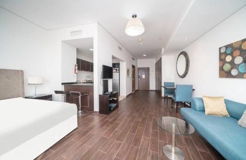 Dubai Sports City Apartment | StoneTree - Spacious Studio - The Matrix