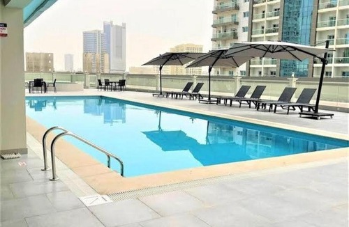 Dubai Sports City Apartment | Stylish Studio Urban Retreat
