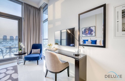 Dubai Apartment | Sunlit Studio At Golf Promenade 2A DAMAC Hills by Deluxe Holiday Homes