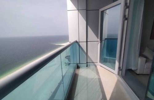 Rumailah Apartment | Two-bedroom hotel apartment with a living room and a sea view, VIP