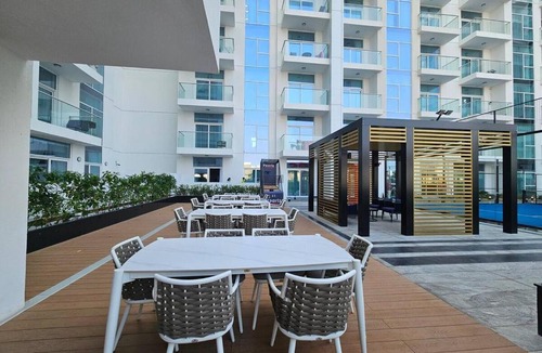Discovery Gardens Apartment | Vogue Vacation Homes, Al Furjan Pearlz by Danube near Ibn Battuta Mall, One Bedroom Apartment with Balcony and vibrant community view, Access to all Amenities, Walkable to Al Furjan Metro Station