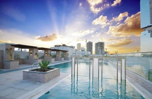 Jumeirah Village Circle Apartment | Yogi 1BR Pool Gym & Balcony JVC